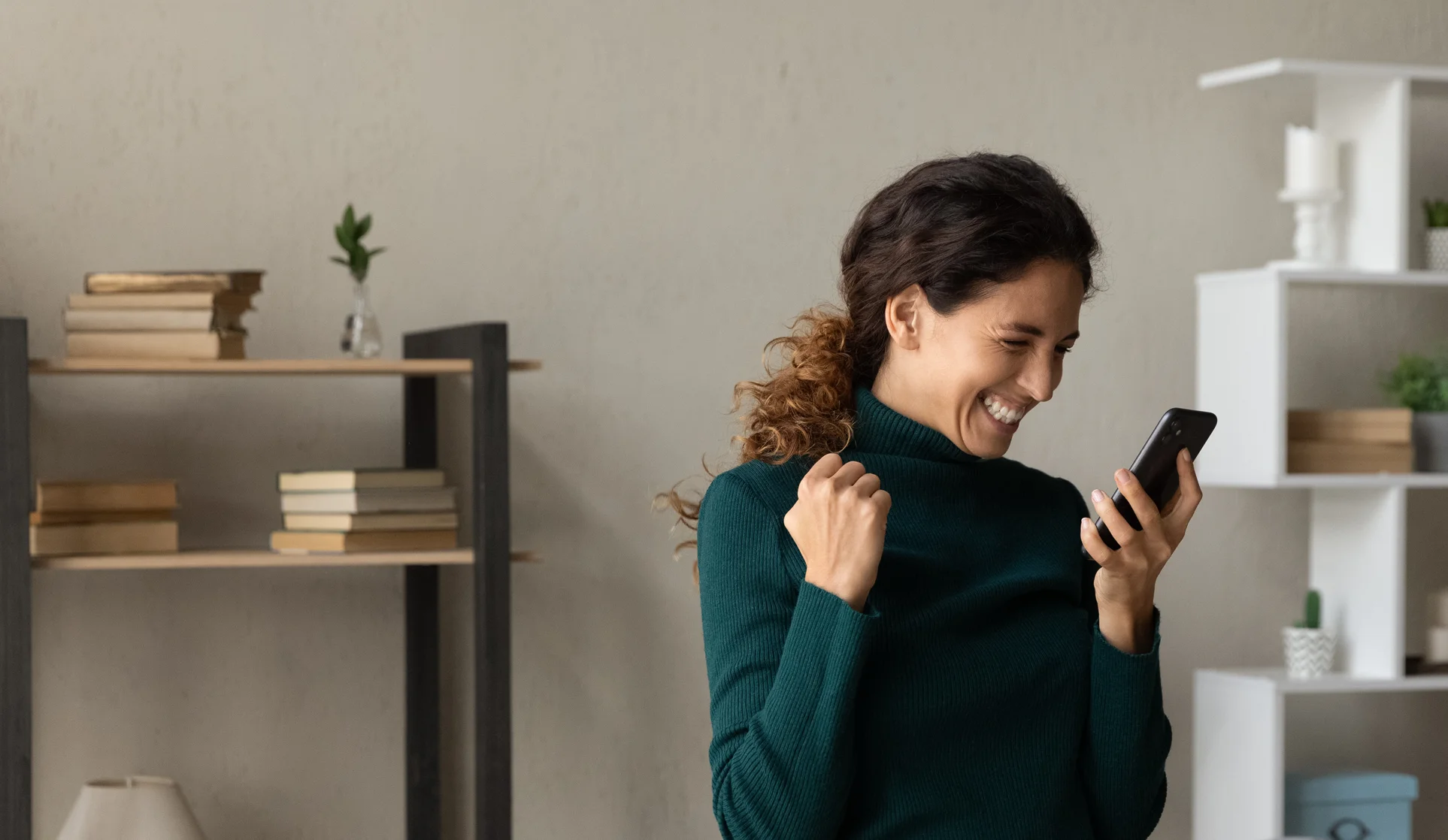 Click To Win: lady winning on her mobile