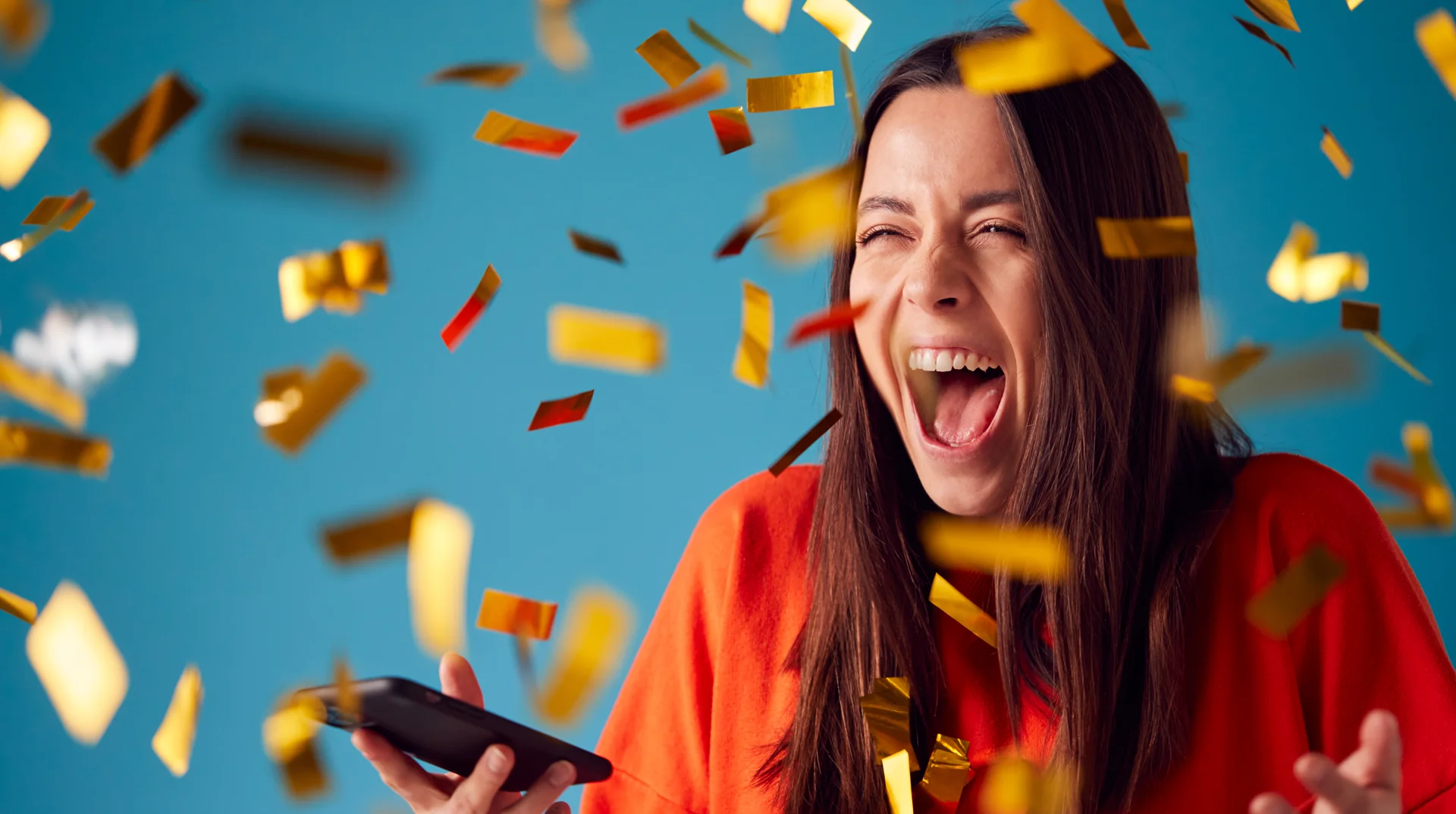 Prize & Reward Fulfilment: woman winning a prize and screaming