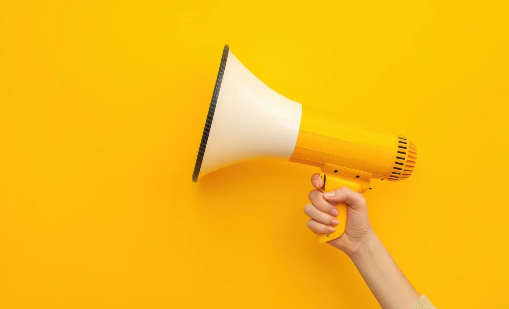 Sales Promotion Examples: yellow megaphone on a yellow background