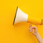 Sales Promotion Examples: yellow megaphone on a yellow background