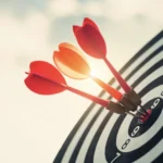 Digital Incentives for Marketing Campaigns: 3 red arrows in a bullseye on a target