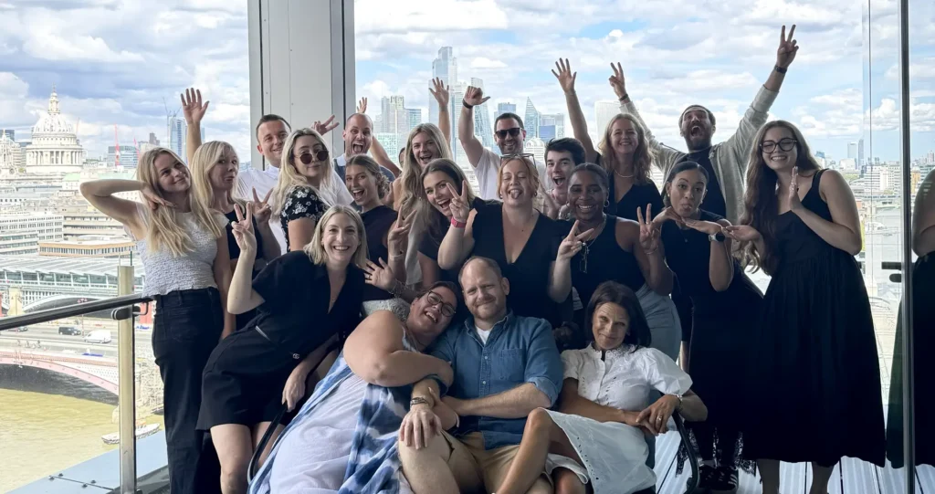 WPP's longest owned company: Mando employees celebrating with London skyline in the background