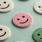 loyalty programmes that increase spend: happy faces made of felt so show repeating, happy customers